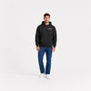Sweat F1 Daniel Ricciardo Signature noir vu de face en plan large avec logo Tourismo