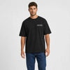T-shirt Chevrolet Camaro Iroc Z Sunset Spec noir vu de face en plan rapproché avec logo Tourismo