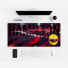 Lewis Hamilton First Win in Red Mouse Mat — on a light-coloured desk.