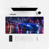 Mouse Pad Nissan Skyline GT R R34, on a light desk with computer, keyboard and mouse