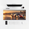 Mouse Pad Porsche 917K Le Mans 1970, on a light desk with computer, keyboard and mouse